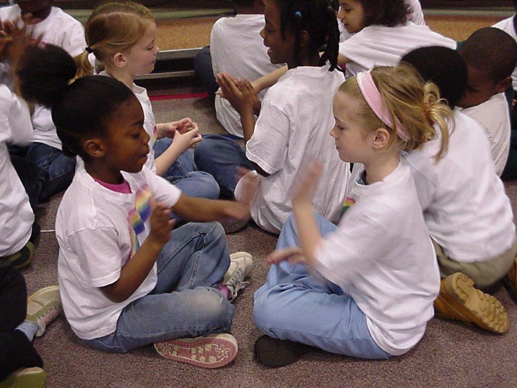 From July 13-15, experts from across the U.S. will meet at the University of Utah to address the issue of bullying and bully prevention in K-12 schools. Pictured here: students from Woodley Hills Elementary in an exercise designed to help the diverse student body become more cohesive and overcome disciplinary problems. The school has seen dramatic improvement in test scores and incidents of suspensions after adopting a curriculum using the Community of Caring's core values as a model.