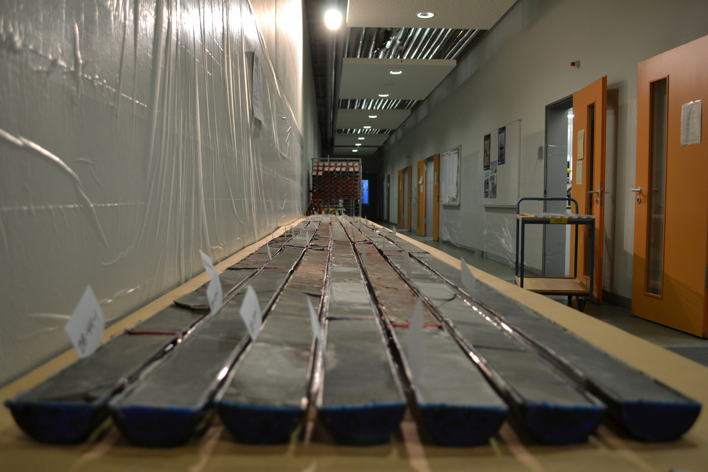 Sediment cores that were drilled from Wyoming’s Bighorn Basin and then sectioned for study are shown at a repository at the University of Bremen, Germany. A study of the cores led by University of Utah geochemist Gabe Bowen found that carbon emissions to the atmosphere during a global warming period almost 56 million years ago were more similar to today’s human-caused climate change than previously was believed.