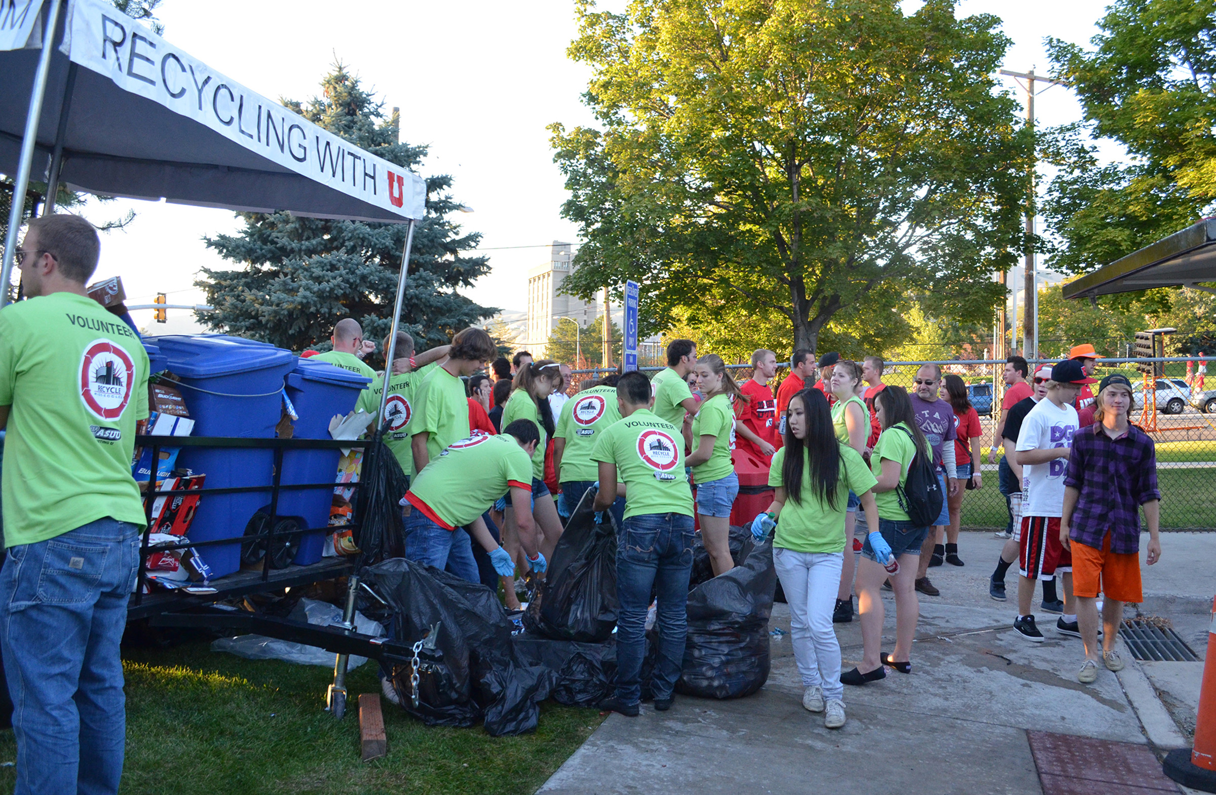 The student-run Recycle Rice-Eccles initiative aims to prevent recyclable items from entering landfills, collecting roughly 25,000 pounds in cans, bottles and other recyclables annually from football tailgating lots. This is one of many ongoing efforts the U has made to “green” university Athletics.