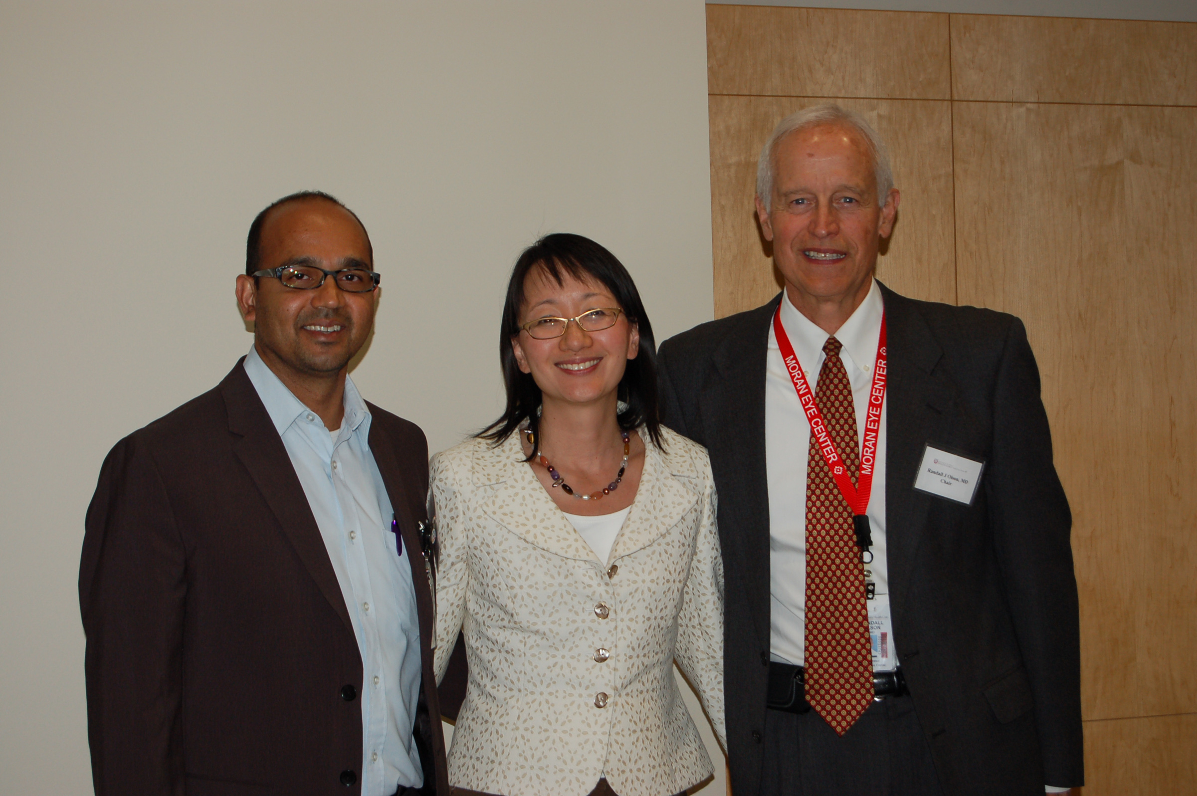 Ronnie Bhola M.D., representative from Trinidad and Tobago, Vivian S. Lee, M.D., Senior Vice President for Health Sciences, Randall J Olson, M.D., CEO of John A. Moran Eye Center.