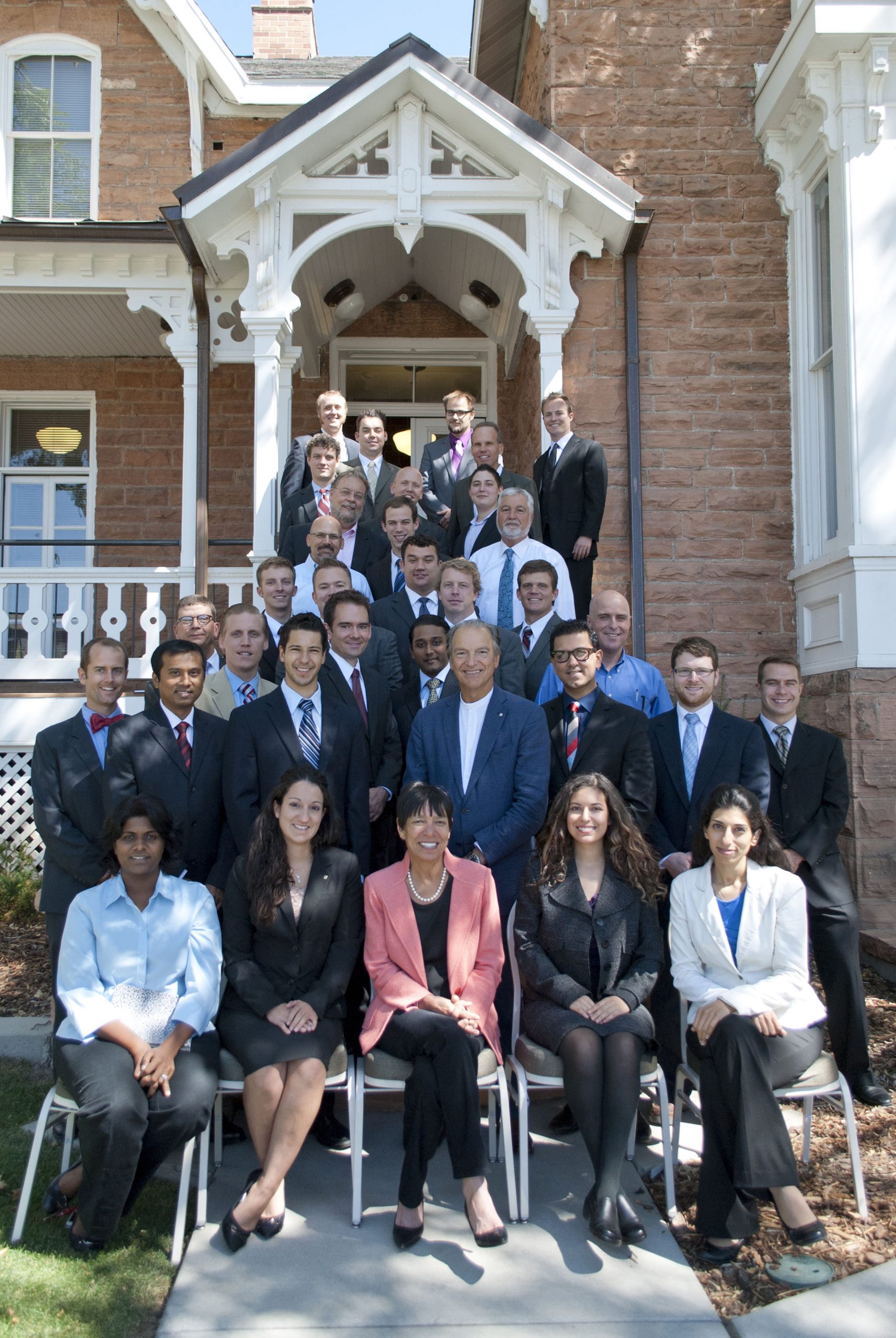 •	Lassonde New Venture Development students stand in front of the Lassonde Entrepreneur Center at the University of Utah.