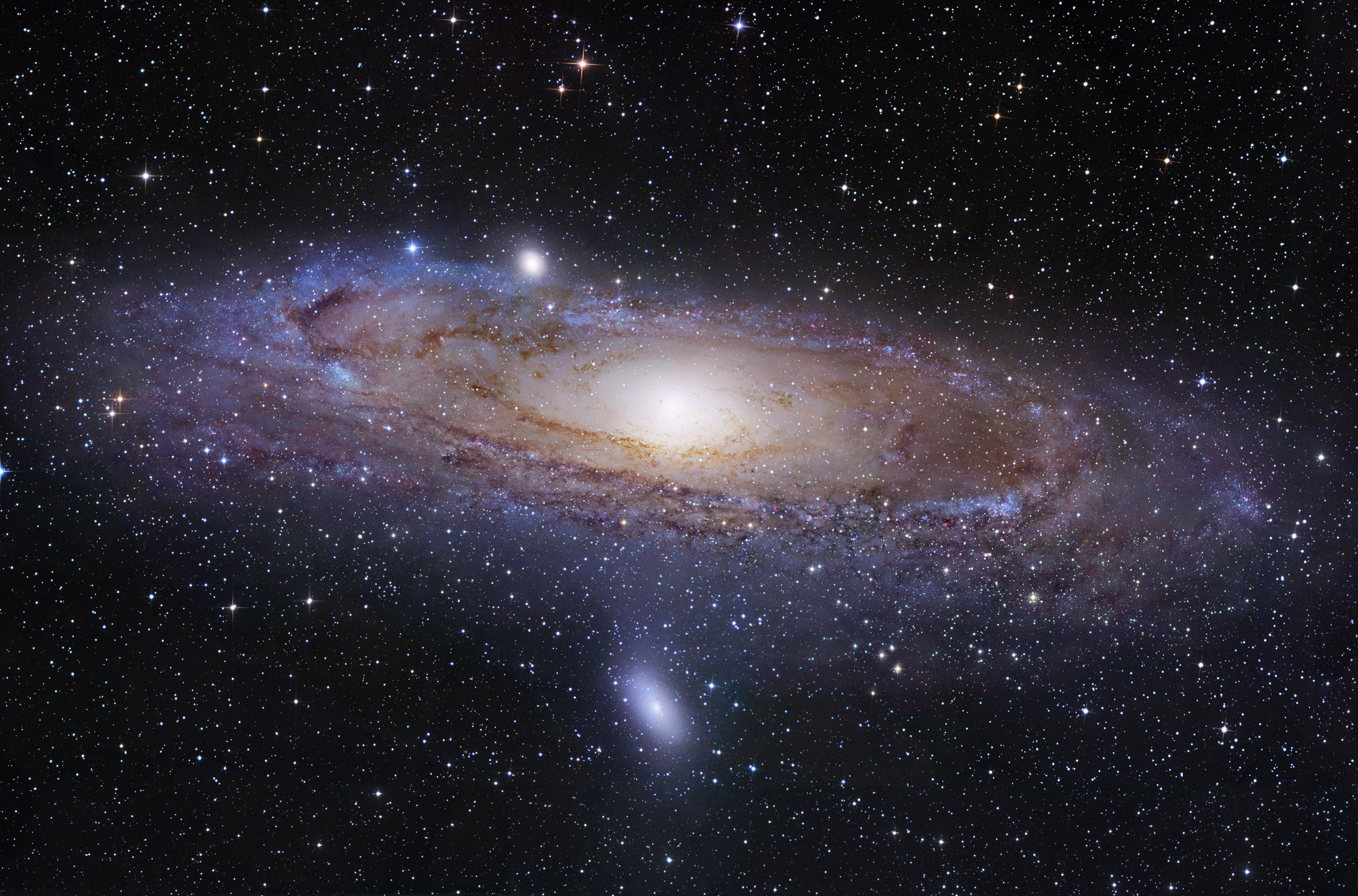 The Andromeda galaxy, shown here, is the closest spiral galaxy to our own spiral, the Milky Way. Astronomers at the University of Utah and elsewhere have launched the Andromeda Project so thousands of volunteers can help them find star clusters in detailed images of Andromeda made by the Hubble Space Telescope.