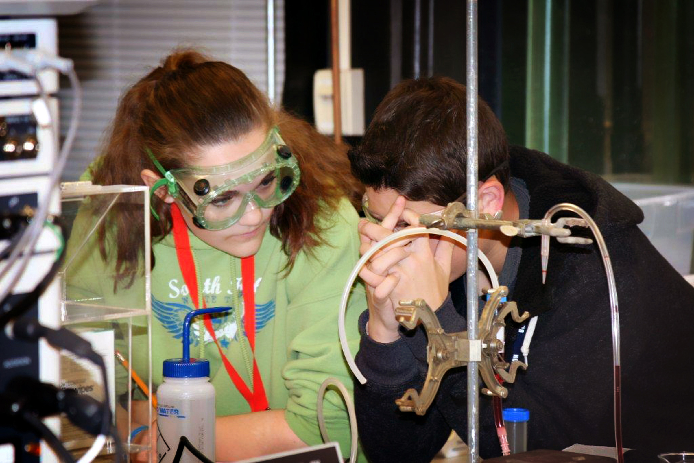 Teammates consult during last year’s Utah Science Olympiad. Some 900 Utah teens will compete at this year’s event, Saturday, April 12 at the University of Utah.