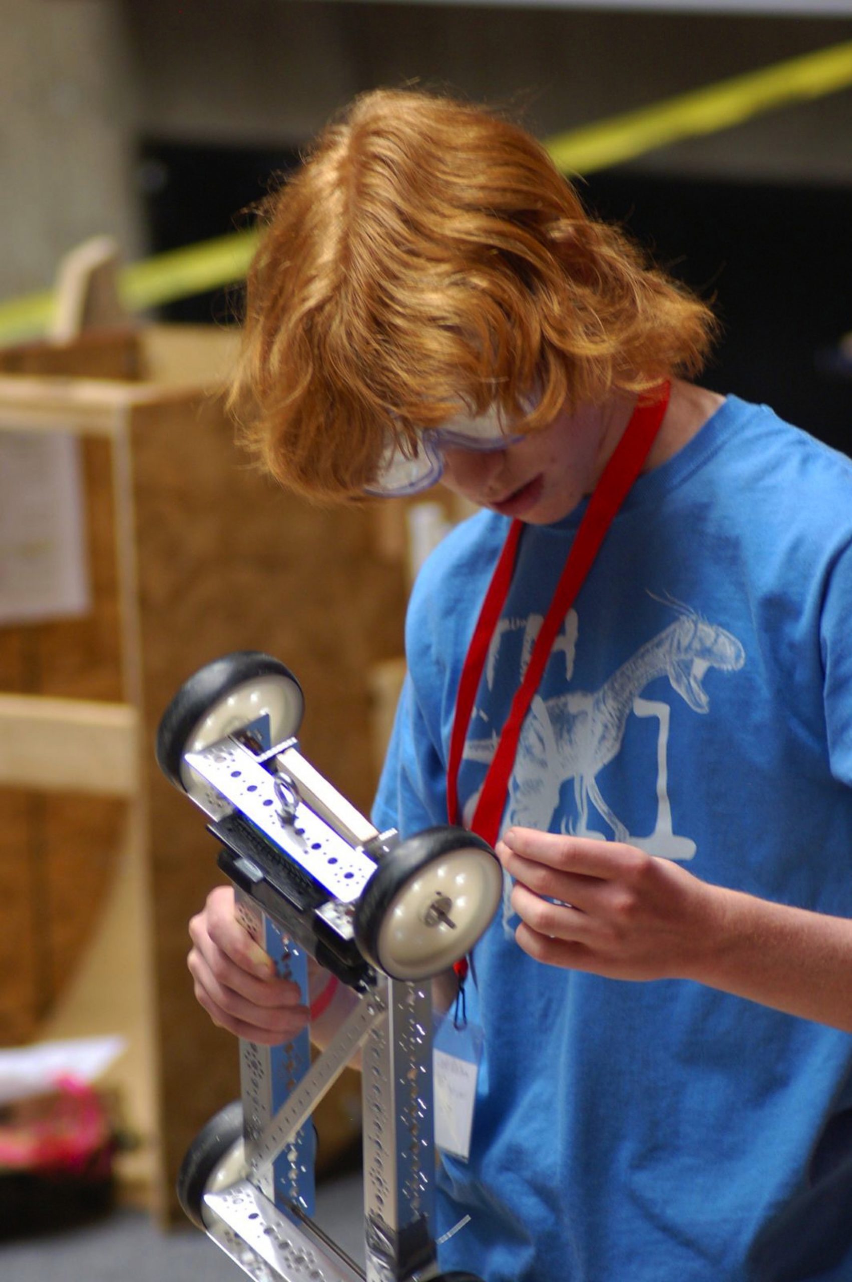 A student competing in the 2012 Utah Science Olympiad adjusts a wheel on his vehicle. More than 900 students will descend on the University of Utah campus for the 2013 Utah Science Olympiad on Saturday, April 13.