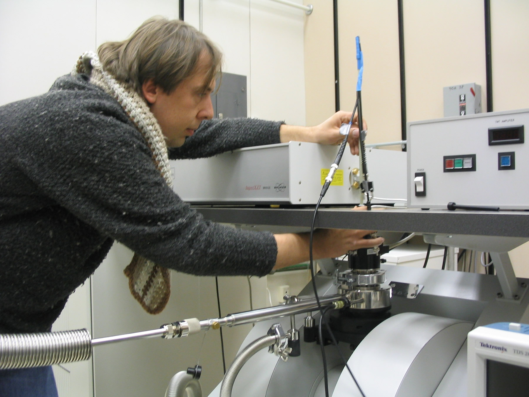 University of Utah physicist Christoph Boehme works with equipment that he uses to show it it feasible for a superfast qunatum computer of the future to read data that is stored in the form of magnetic "spins" of phosphorus atoms.