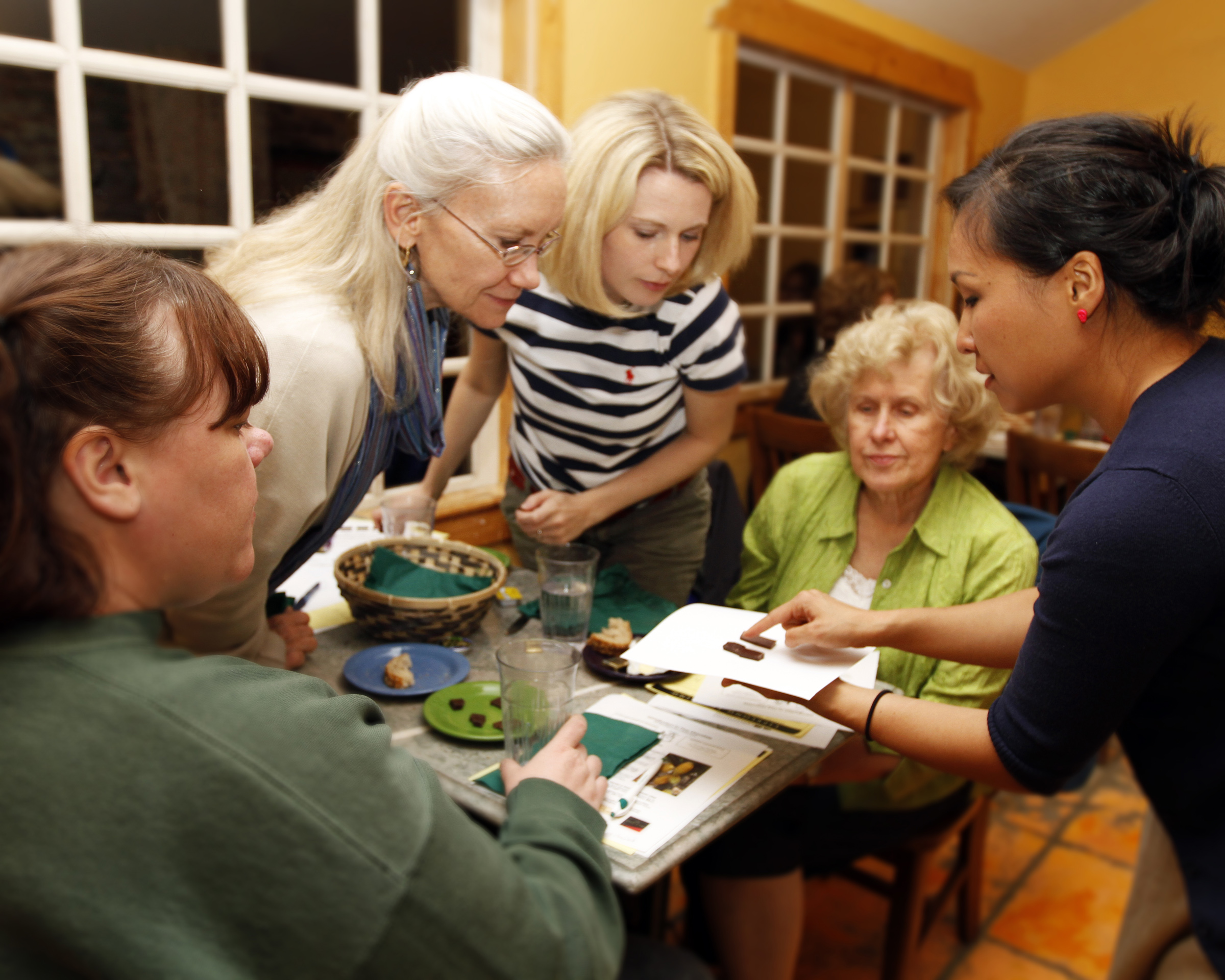 Instructor Vanessa Chang (right) discusses some of Utah’s finest chocolates.