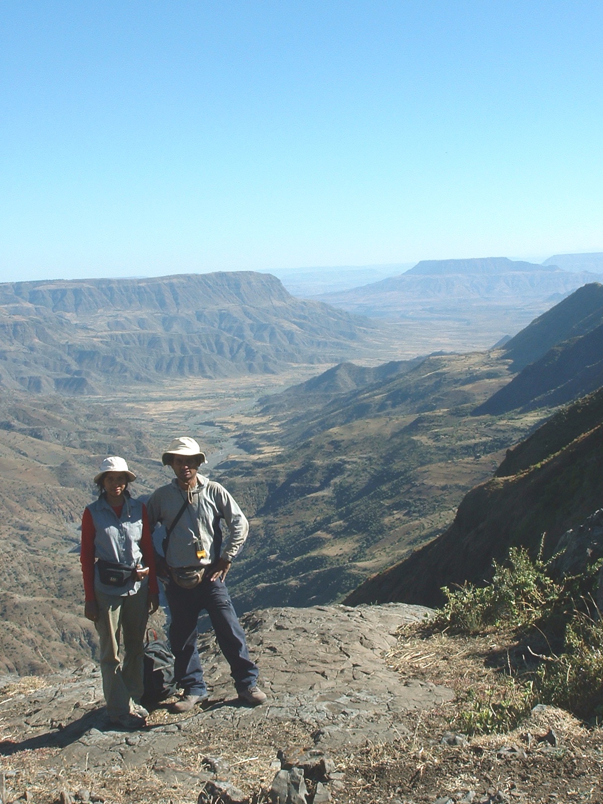 Nahid and Royhan Gani, geologists at the University of Utah's Energy and Geoscience Institute, stand on the Ethiopian Plateau near the Gorge of the Nile, which was carved by Africa's Blue Nile River. The Ganis are studied the timing of the canyon's incision to learn more about how movements of Earth's crust are related to human evolution.