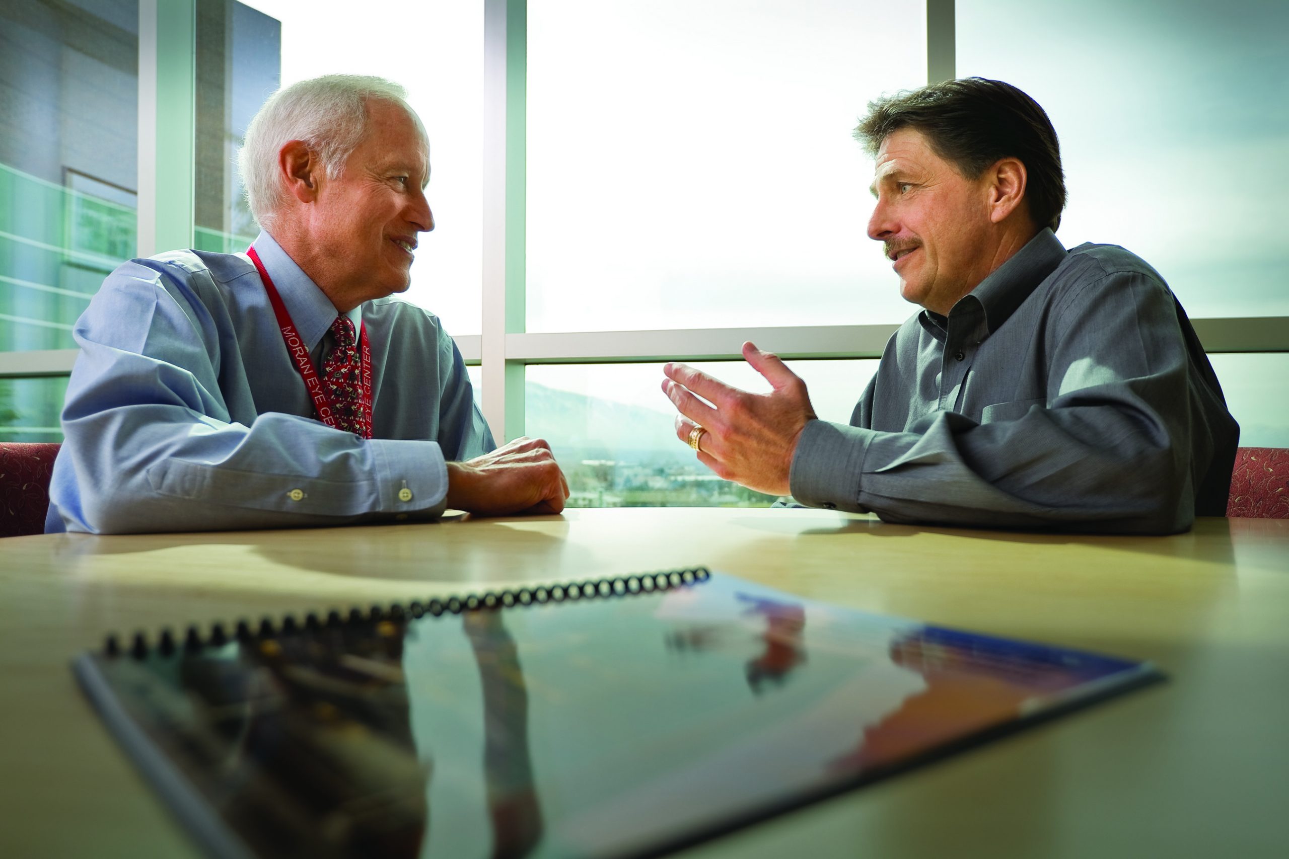 Randall J Olson, M.D., CEO of the John A. Moran Eye Center (left), And Gregory S. Hageman, Ph.D., Director of the Moran Center for Translational Medicine at the John A. Moran Eye Center (right).