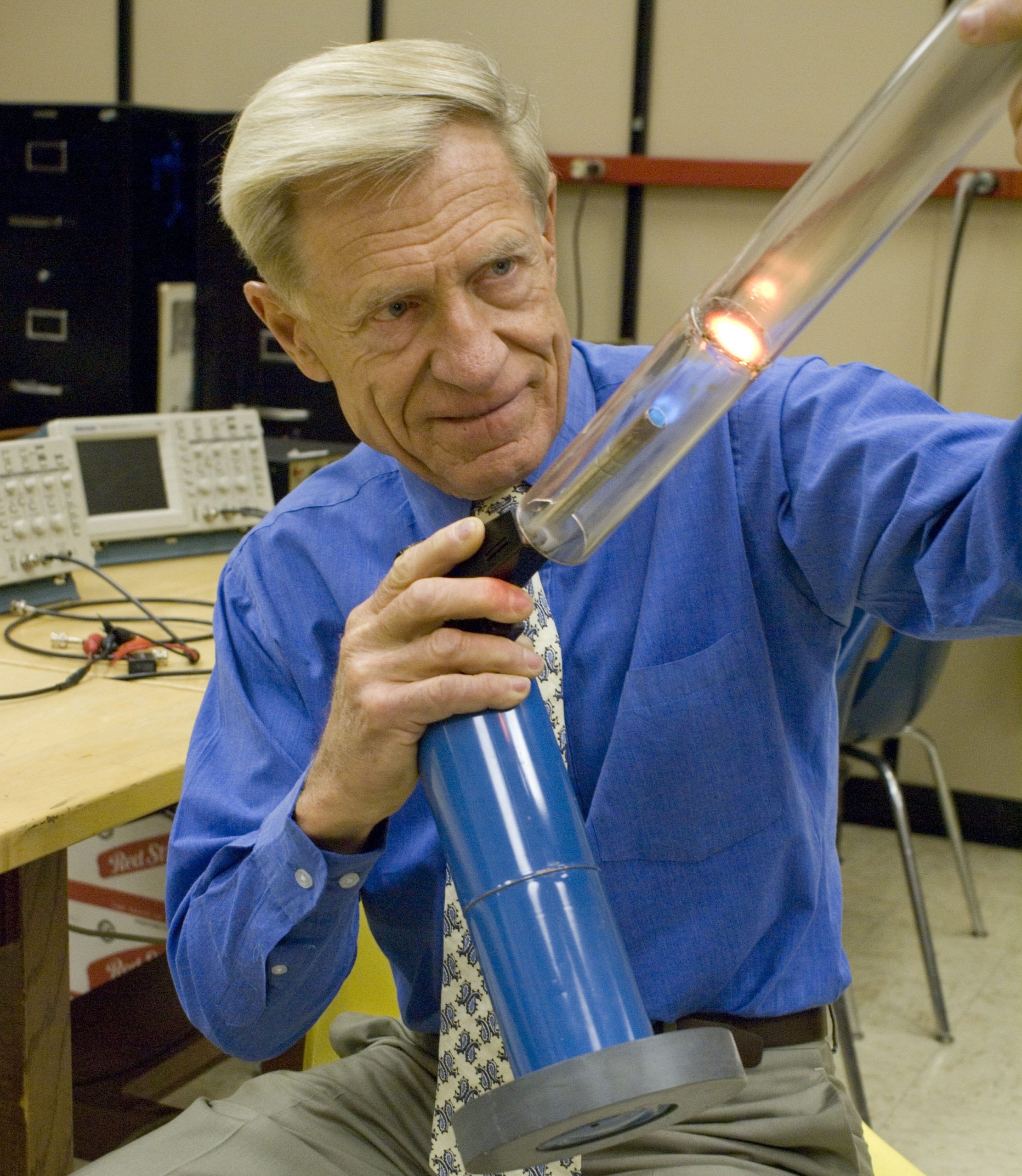 University of Utah physicist Orest Symko demonstrates how heat can be converted into sound by using a blowtorch to heat a metallic screen inside a plastic tube, which then produces a loud tone, similar to when air is blown into a flute. Symko and his students are developing much smaller devices that not only convert heat to sound, but then use the sound to generate electricity. The devices may be used to cool electronics, harness solar energy in a new way, and conserve energy by changing waste heat into electric power.