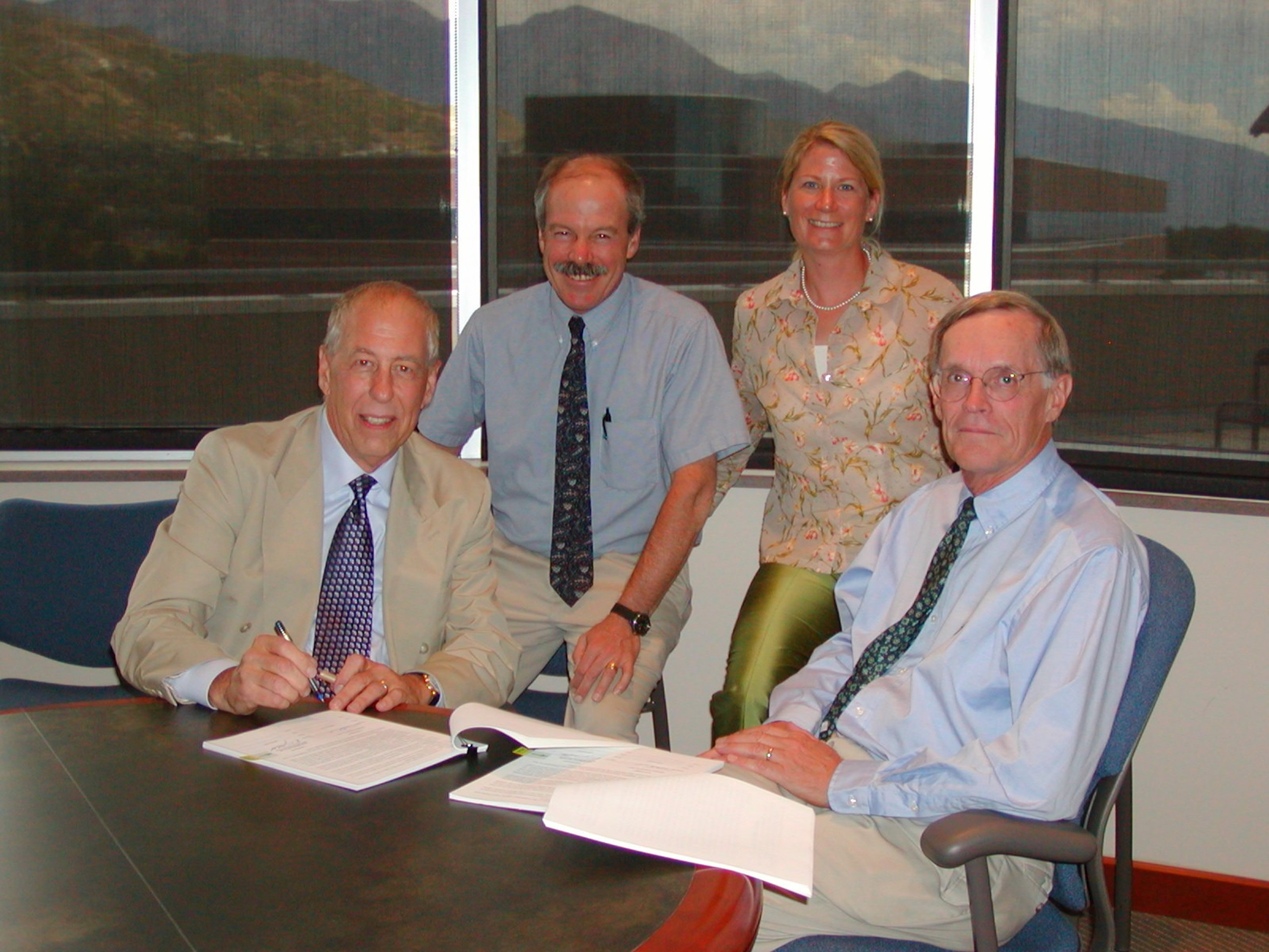 Left to right: Dr. Richard K. Koehn, President & CEO, Sentrx; Dr. Glenn D. Prestwich, Chairman of Medicinal Chemistry, U of U; Sheryl G. Hohle, Sr. Licensing Manager, U of U; and Dr. Raymond F. Gesteland, Vice President of Research, U of U.